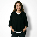 Ottavia | Pull tipo poncho in maglia con cappuccio e maniche a tre quarti.