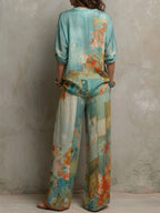 Mirella | Elegante completo con stampa floreale e pantaloni larghi