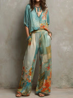 Mirella | Elegante completo con stampa floreale e pantaloni larghi